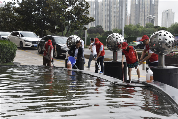 集团公司联合商务区社区开展“清洁家园 美化社区” 主题志愿服务活动